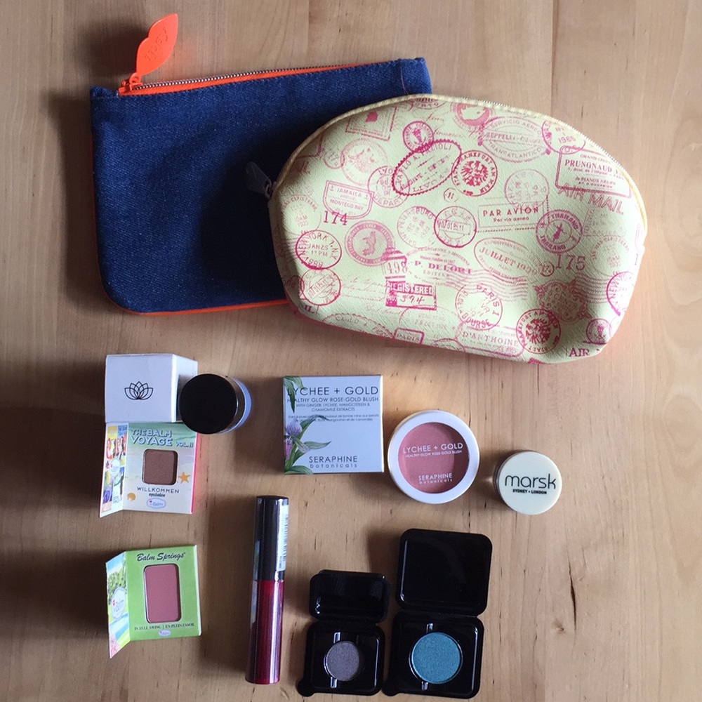 Set of Ipsy bags with makeup goodies.